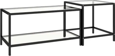 A product shot of two nesting tables with black metal frames and transparent glass tops and shelves, set against a white background.