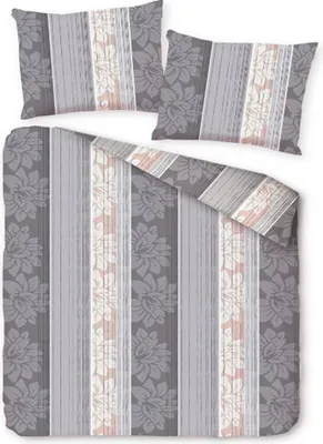 A bedding set with two pillowcases and a duvet cover, laid out flat.