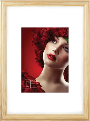 A framed picture of a woman with roses in her hair.