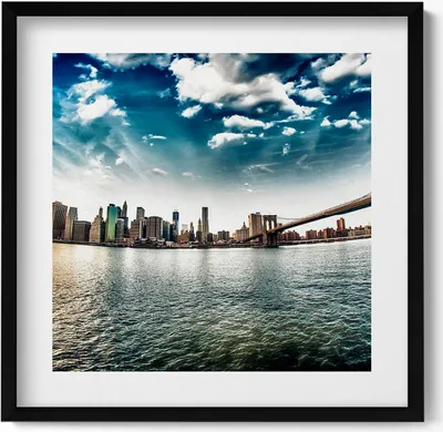 Produktbild von Die Stadt und die Brooklyn Bridge– Wandbild mit Rahmen – Gerahmtes Bild  – Wanddekoration – 50x50 cm –  Schwarz Rahmen