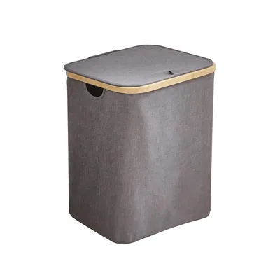 A grey fabric laundry basket with a bamboo rim and lid, shown against a white background.