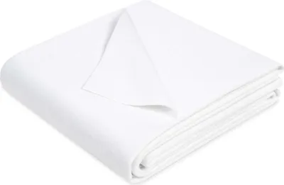 A white waterproof mattress protector is folded and presented on a white background.