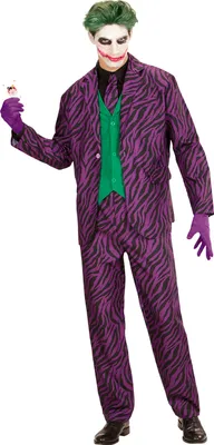 A person dressed in a Joker costume, holding a playing card.