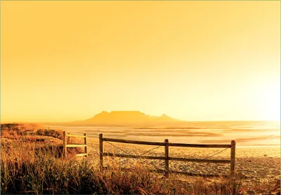 Produktbild von Wallario Fototapete Vliestapete, seidenmatte Oberfläche, einfache Verarbeitung, Größe 400 x 280 cm, Motiv Strand in Südafrika I - Himmel in orange