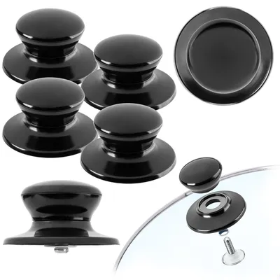 A collection of black pot lid handles arranged on a white background.