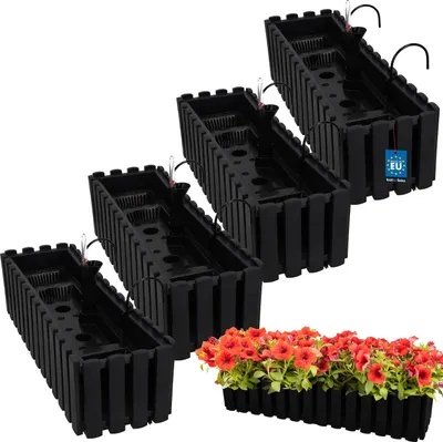 A set of four black self-watering planters are arranged diagonally, with a tray of red flowers in the foreground.