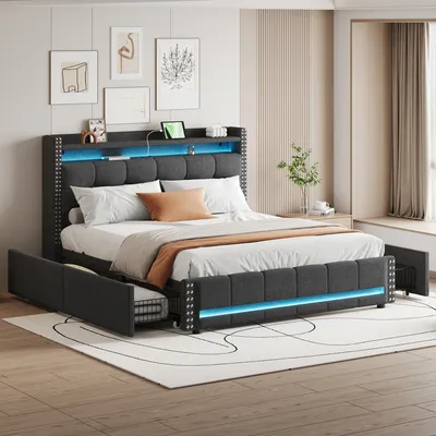 A bedroom scene featuring a modern upholstered bed with integrated LED lighting and storage drawers.