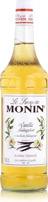 A bottle of Monin Vanilla Madagascar syrup.