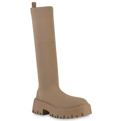 A single beige boot with a thick sole is shown against a white background.