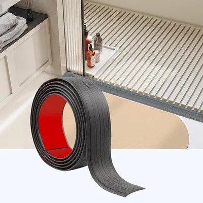 Immagine prodotto di Soglia autoadesiva per porte - Battiscopa in PVC - 200 cm x 5 cm - grigio scuro
