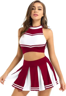A woman is modeling a cheerleader costume.