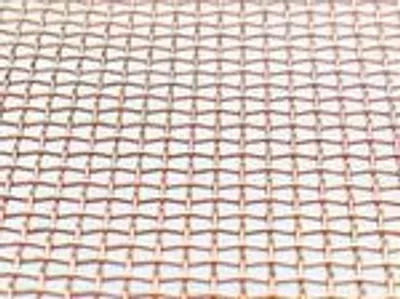 A close-up view of a woven copper mesh.