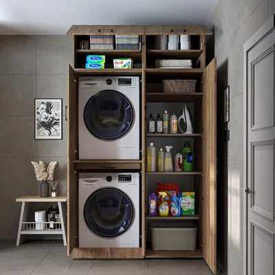 A laundry room with a washing machine cabinet.