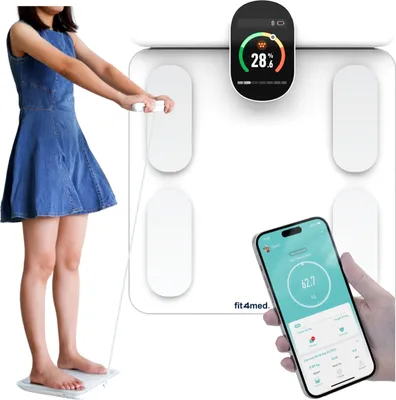 A person is using a smart scale, and a smartphone displays the scale's data.