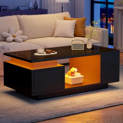 Immagine prodotto di Tavolino LED lucido Merax con cassetto e 4 vani portaoggetti laterali, tavolino da salotto con design traforato al centro, nero