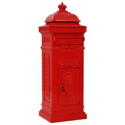 A red vintage-style pillar mailbox.