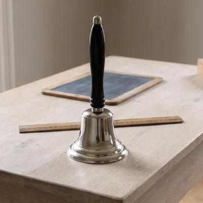 Produktbild von Schulglocke aus Messing, vernickelt, mit schwarzem Holzgriff, H.21 cm