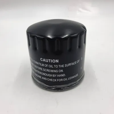 A black oil filter is shown against a white background.