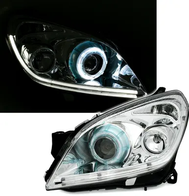 Produktbild von SCHEINWERFER SET in CHROM für OPEL ASTRA H alle mit Halogen EAGLE EYES H9