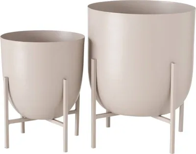 Two beige metal planters on stands, shown against a white background.