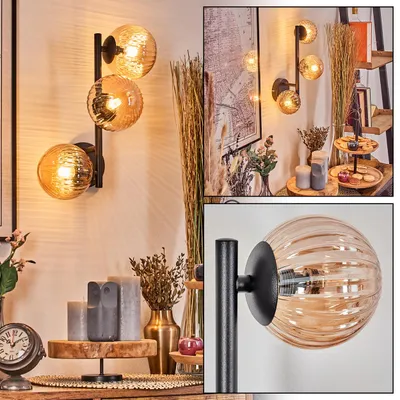 Produktbild von Isorella Wandlampe aus Metall/Riffelglas in Schwarz/Bernsteinfarben