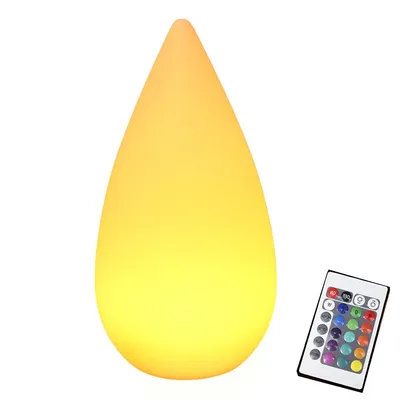 A teardrop-shaped lamp with a remote control on a white background.