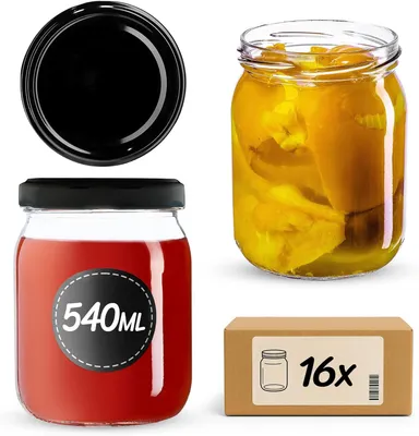 A collection of glass jars and a cardboard box, likely for sale.