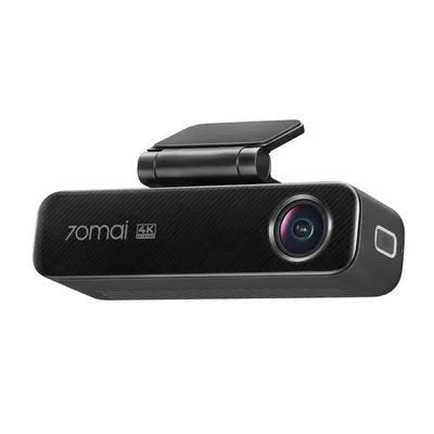A black dashcam with a carbon fiber texture and a small screen on top, presented against a white background.