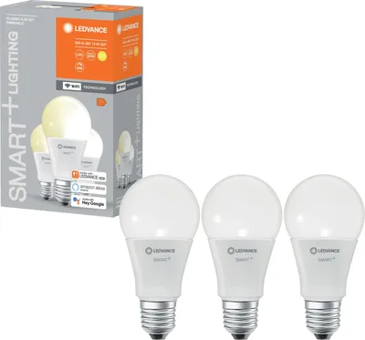 A product shot of a box of LEDVANCE smart light bulbs and three individual bulbs.
