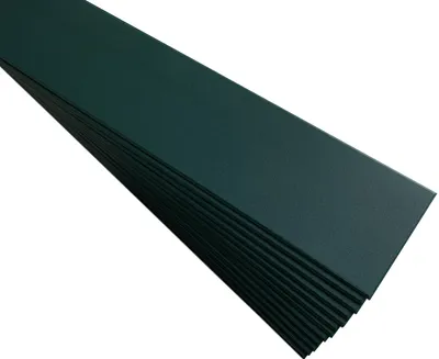 A stack of dark green decorative foam panels, arranged diagonally on a white background.