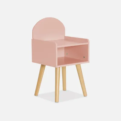A pink children's bedside table with wooden legs, shown against a white background.