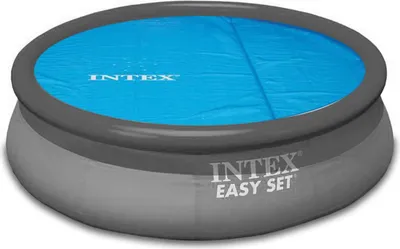 An inflatable pool with a blue solar cover.