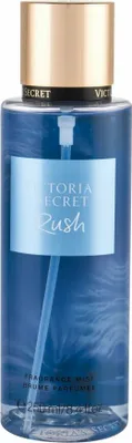 A bottle of Victoria's Secret Rush fragrance mist.