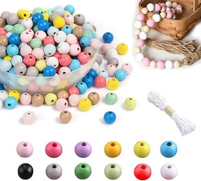Immagine prodotto di Sfere di legno colorate da 12 mm con foro da 3 mm in 12 colori
