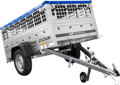 A silver trailer with a blue tarp cover, shown from a diagonal angle against a white background.