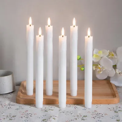 Immagine prodotto di 6 candele a LED, luce bianco caldo, 19 cm, senza fiamma, alimentate a batteria, ideali per decorazioni natalizie, matrimoni, feste e altri eventi, colore bianco