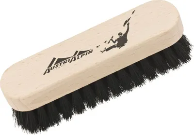 Boulderbürste aus Naturhaar von Austri Alpin; mit schwarzem Borstenkopf und hellem Holzgriff; für Kletterbedarf.