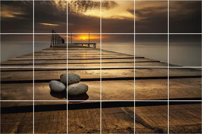 Produktbild von Fliesenaufkleber 15x15 cm – 24 Stück – Selbstklebend – Wasserfest – Pflegeleicht – Hitzebeständig – Für Küche & Bad – Pier über dem Wasser bei Sonnenuntergang
