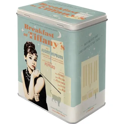 A tin box featuring Audrey Hepburn from Breakfast at Tiffany's.
