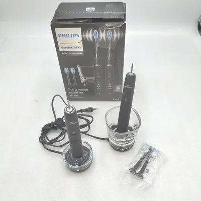 Produktbild von Philips DiamondClean 9000 HX9914/63 2x Elektrische Schallzahnbürsten + 4 C3 Bürstenköpfe, Erwachsener, Schallzahnbürste, Tägliche Pflege, Tiefenreinigung, Zahnfleischpflege, Whitening, Schwarz, 2 min, 4 x 30 sec, Akku