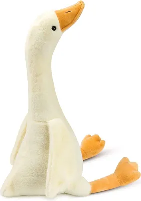 A plush goose toy sitting down, viewed from the side.