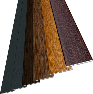 Four different colored strips of material, likely trim or molding, are arranged diagonally.