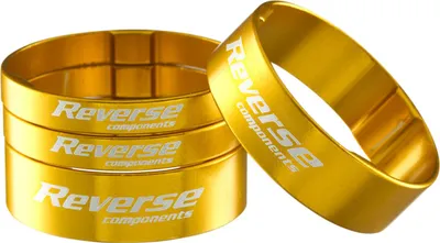 Produktbild von Reverse Alu Vorbau / SCS Spacer Set 1 1/8'' 2x 5mm 2x 10mm gold