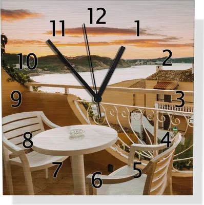 Produktbild von Wallario Design Wanduhr Sommer in Spanien - Ausblick von einer schönen Terrasse auf das Meer aus Aluverbund, Größe 30 x 30 cm