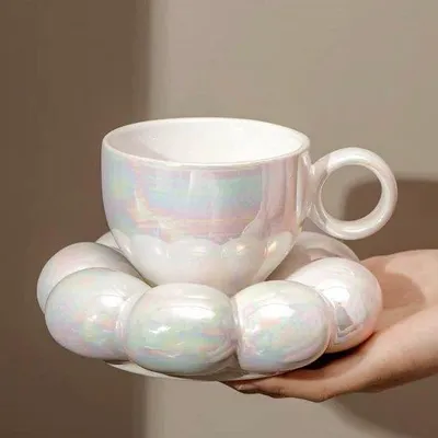 Produktbild von Keramikbecher mit Sonnenblumenmotiv, Tasse mit Unterteller