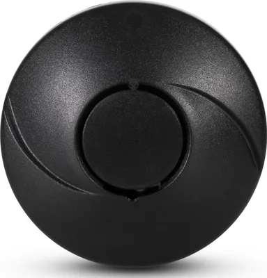 A close-up, top-down view of a black, circular smoke detector.