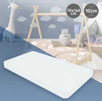 A white mattress is shown in the foreground, with a child's bedroom scene in the background featuring a wooden teepee bed, stuffed animals, and decorative clouds.