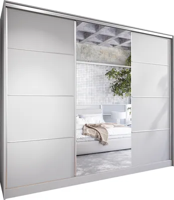 A sliding door wardrobe with mirrored doors reflecting a bedroom interior.