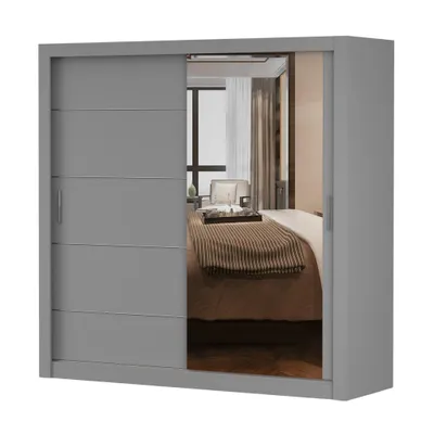 A gray wardrobe with a mirrored door, shown in a bedroom setting.