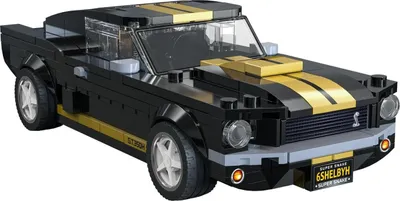 A black and gold Lego model of a Shelby GT 350H car.